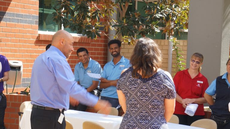 Goodwin staff receiving their certificates for completing the year-long dementia research and training program